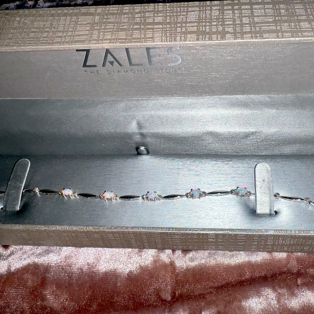 Oval Lab-Created Opal and Diamond
Accent Bracelet in Sterling Silver - 7.25"